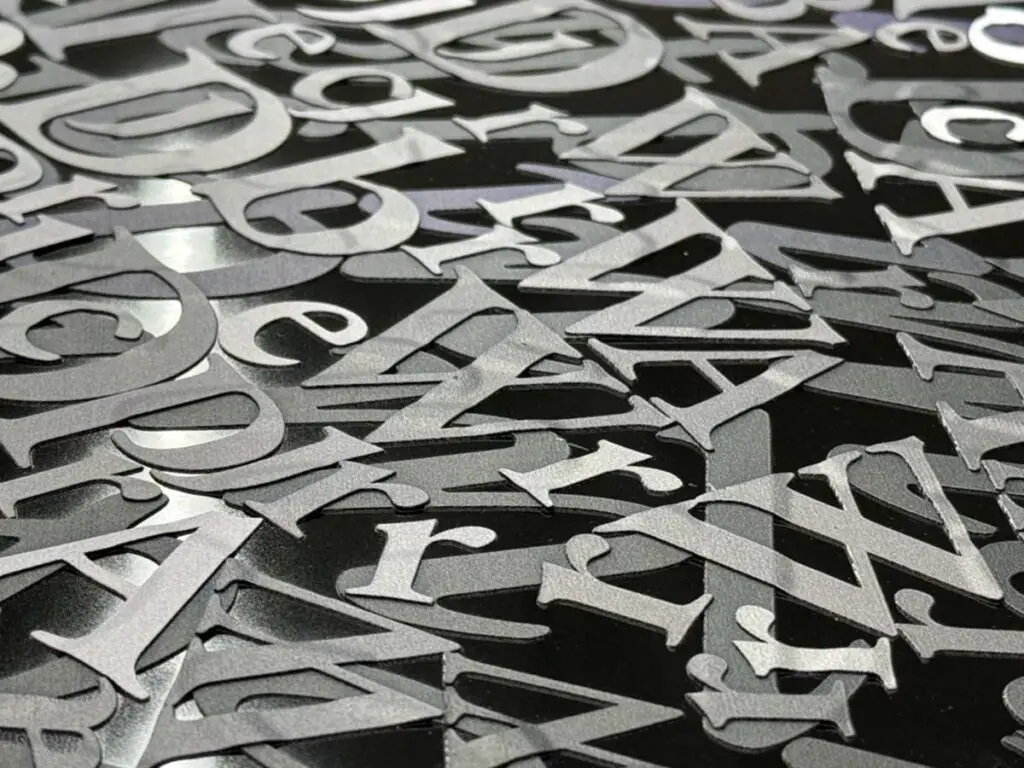Close detail of manual letter application in CHriZ artwork